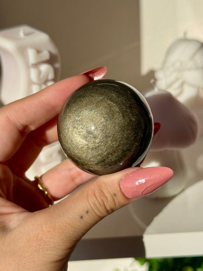 Sfera in ossidiana dorata