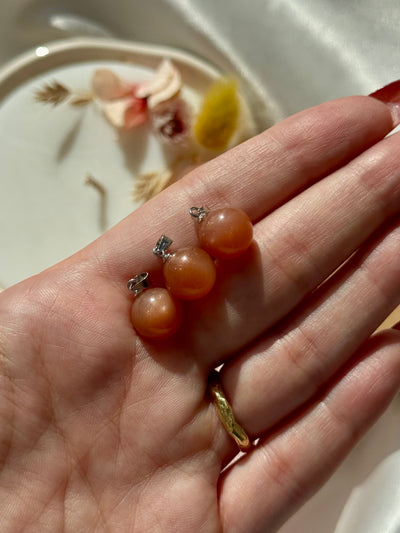 Ciondolo in pietra del sole e pietra di luna pesca